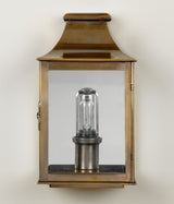 Powis Vägglykta – Brass